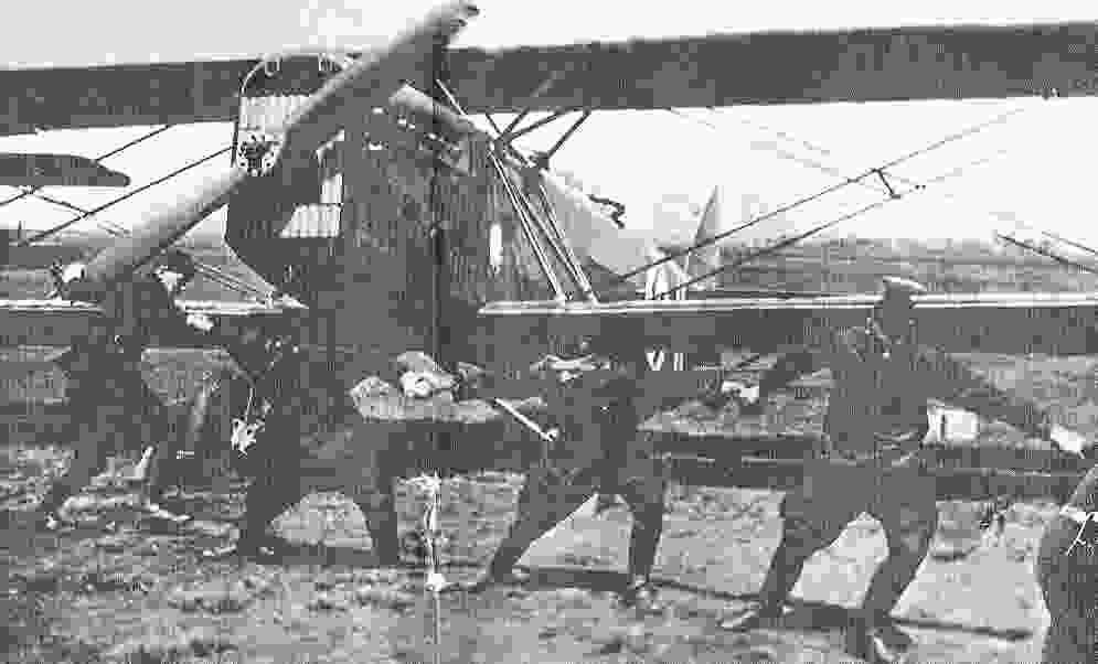Turning the prop to start the engine